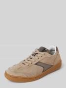 Platte lage sneakers met glanzende applicaties