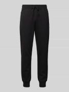 Relaxed fit sweatpants met ritszakken