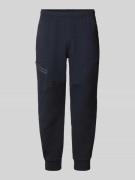 Relaxed fit sweatpants met ritszak