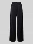 Wide leg sweatpants met labelopschrift, model 'SIMA'