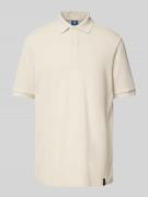 Poloshirt van viscose met labeldetail