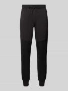 Regular fit sweatpants met labeldetail