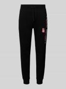 Slim fit sweatpants met labelprint