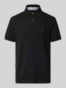 Slim fit poloshirt van piqué