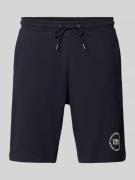 Regular fit sweatshorts met statementstitching