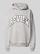 Oversized hoodie met labelprint