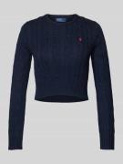 Korte gebreide pullover met ribboorden