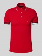 Slim fit poloshirt van een mix van katoen en elastaan