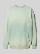 Oversized sweatshirt met labelprint, model 'Matcha Mornings'