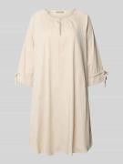 Knielange jurk met druppelvormige hals