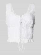 Korte top met vetersluiting