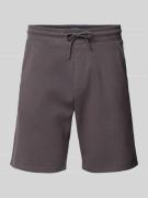 Korte broek met elastische band en steekzakken