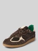 Sneaker van echt leer met contrastgarnering