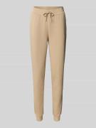 Slim fit sweatpants van katoenmix met tunnelkoord
