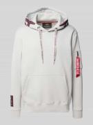 Hoodie met kangoeroezak en ritszak opzij