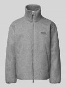 Jack met opstaande kraag en tweewegsritssluiting