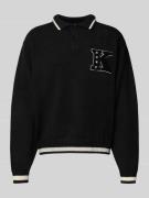 Gebreide pullover met polokraag en stitching