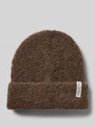 Muts van een mix met wol en alpaca