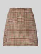 Licht uitlopende minirok met ruitmotief