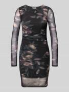 Smalle mini-jurk met semi-transparante mouwen, model 'KAYA'