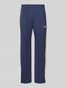 Sweatpants met lengtenaden en labelprint