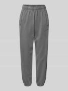 High waist sweatpants met elastische band