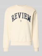 Sweatshirt met ronde hals met varsiety-emblemen