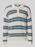 Gebreide pullover met polokraag en knoopsluiting
