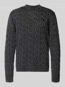 Gebreide pullover met kabelpatroon en labelstitching