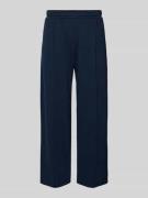 Sweatbroek met bies en varsiety-emblemen