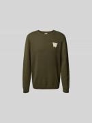 Trui in gebreide look