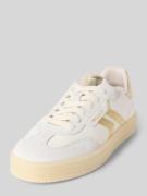 Lage sneakers van een mix van runderleer en textiel