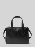 Handtas met labelapplicatie