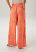 NU 20% KORTING: Aniston CASUAL Comfortbroek met trendy bloemenprint - ...