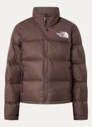 The North Face 1996 Retro Nuptse puffer jack met donsvulling en opberg...